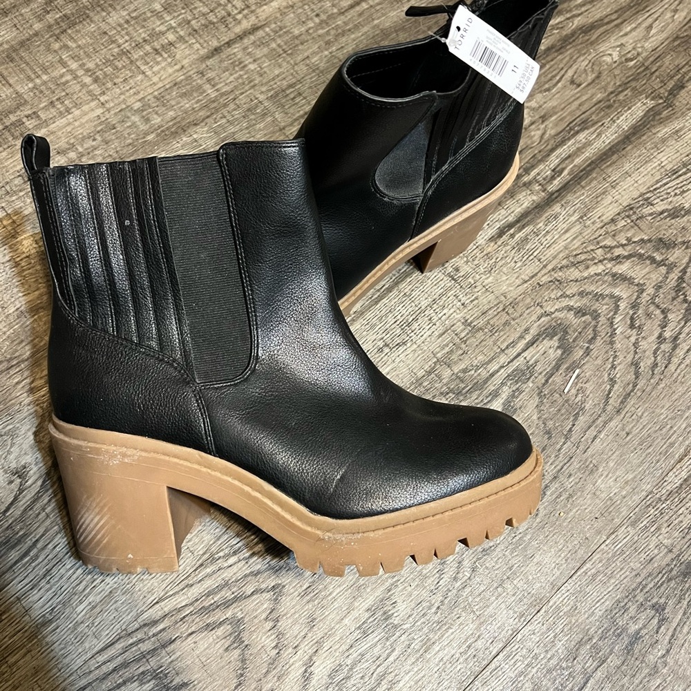 Torrid Black Heeled Boots with Brown Sole